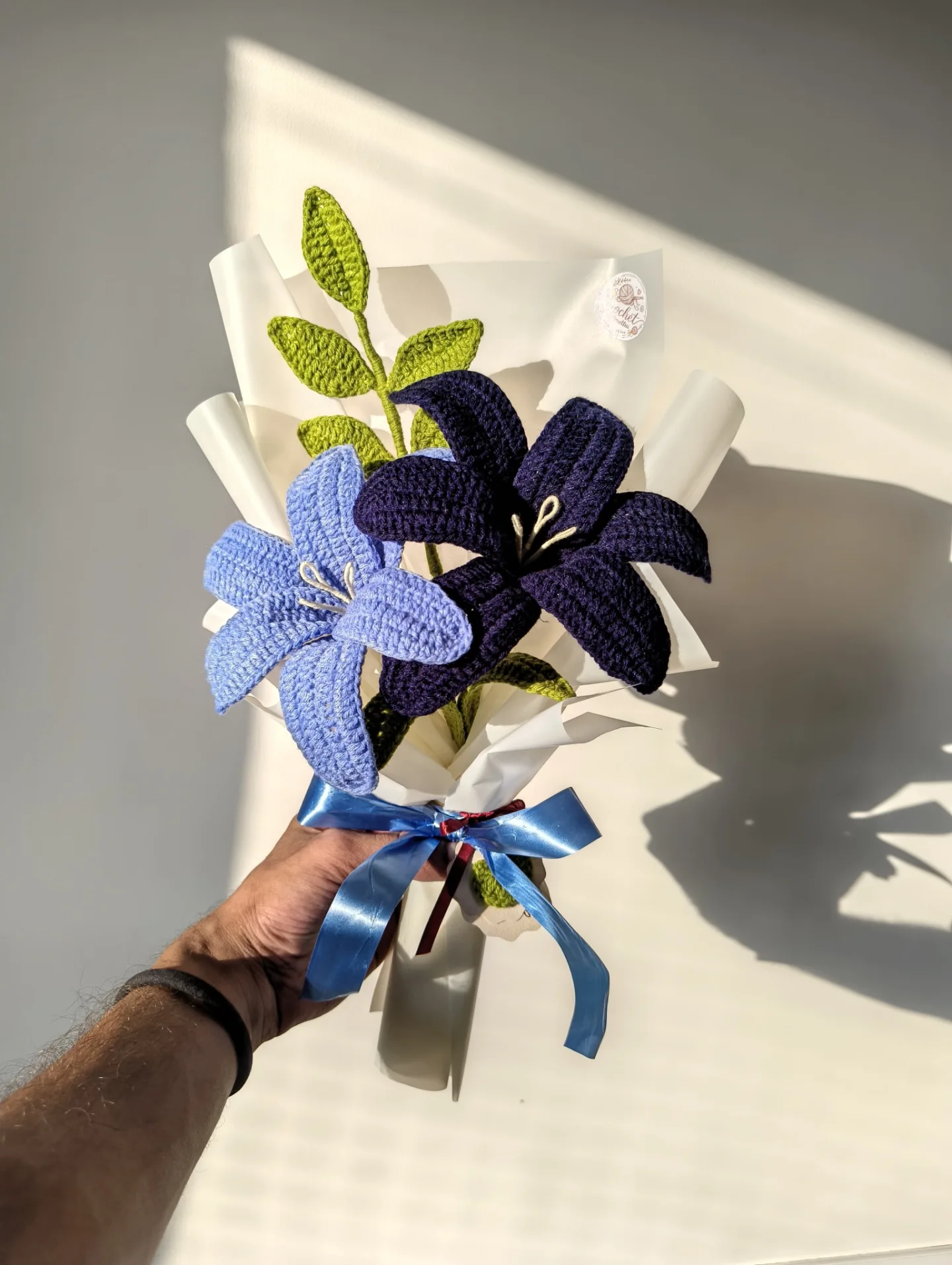 Indigo and cornflower crochet lilies.